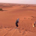 Morning Desert Safari Dubai sandboarding
